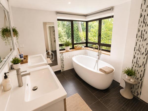 Située dans un environnement enchanteur et privilégié , découvrez cette magnifique maison à vendre offrant une superficie généreuse de 248 m². Parfaite pour les amoureux de la tranquillité et de la nature, elle incarne un style de vie paisible. 

Avec ses 9 pièces spacieuses DE PLAIN-PIED, cette demeure de 1985 offre une disposition harmonieuse entre le salon, la cuisine, deux espaces nuits une salle de sport/cinéma. Trois places de parking complètent ce bien rare et recherché. 

Profitez également d'un balcon et de deux grandes terrasses pour vos moments de détente. Connue pour son environnement paisible et sans vis-à-vis, cette maison est votre havre de paix sans être isolée du monde moderne.
DPE A/A exceptionnel pour une maison de 1985,  chauffage par pompe à chaleur couplée à une installation de panneaux photovoltaïques et une seconde installation photovoltaïque en autoconsommation.
Cheminée, atelier, cave à vins, cave double carport

Familiale et chaleureuse, elle est prête à accueillir de nouveaux souvenirs sans nécessiter de travaux. N'attendez plus pour vivre dans un cadre des plus séduisants ! Pour toute information, contactez Monsieur Gilles Eon.