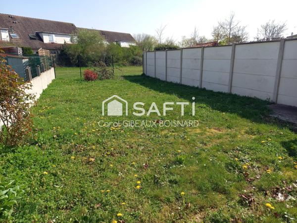 Maison jumelée atypique avec garage et jardin