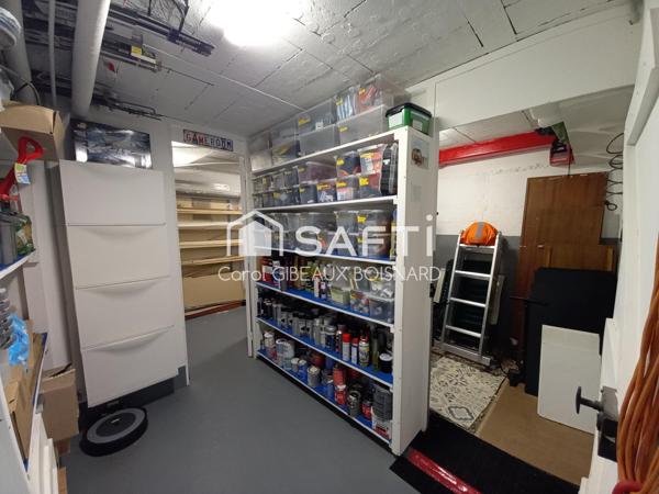 Maison jumelée atypique avec garage et jardin