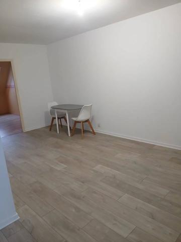 Appartement 2 chambres, stationnement et cave