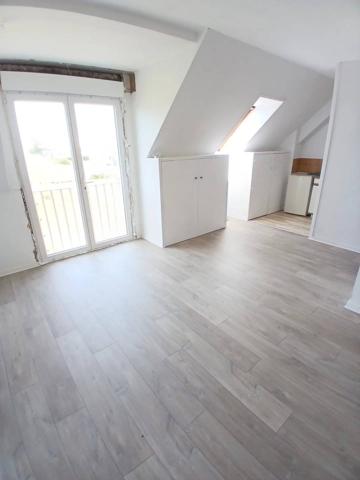 Appartement 2 chambres, stationnement et cave