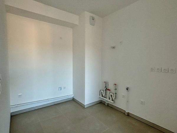 Appartement T2 de 43m² avec terrasse et place privative de stationnement