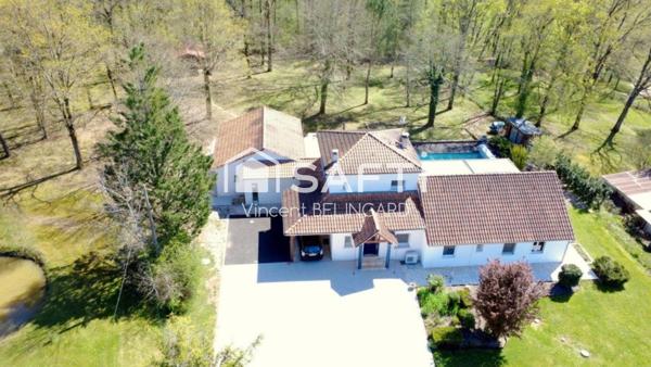 Maison 9 pièces avec atelier piscine et garage double