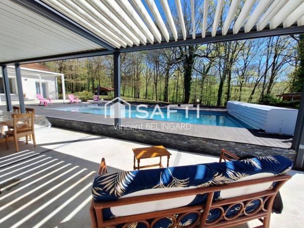 Maison 9 pièces avec atelier piscine et garage double