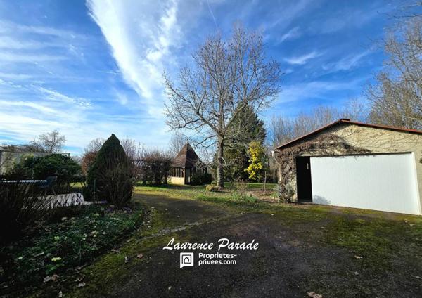 Maison  parc, avec garage, puits