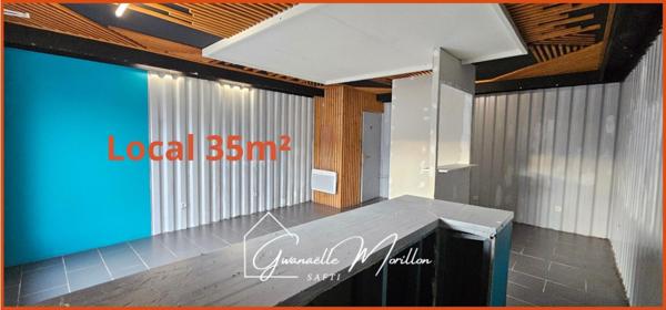 2 locaux commerciaux et 1 habitation.