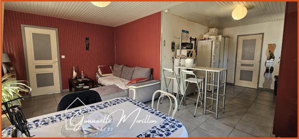 2 locaux commerciaux et 1 habitation.