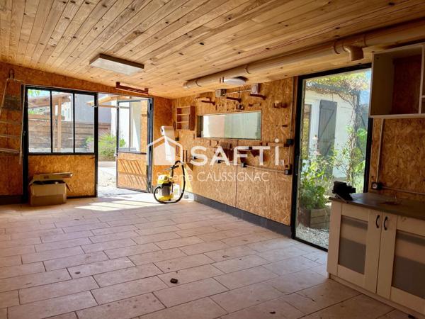 Maison de plain pied  avec dépendance dans quartier résidentiel