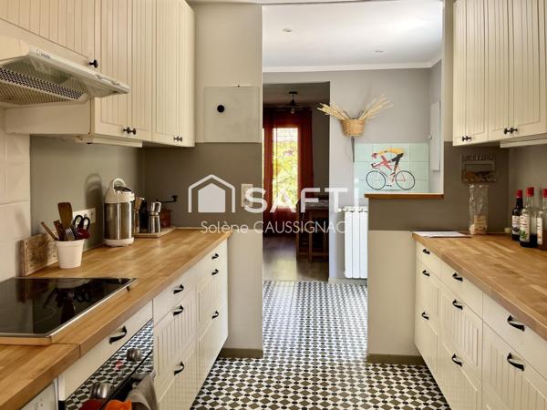 Maison de plain pied  avec dépendance dans quartier résidentiel