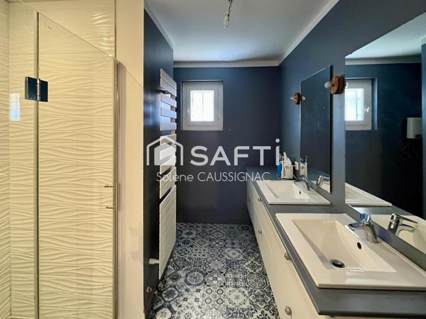 Maison de plain pied  avec dépendance dans quartier résidentiel