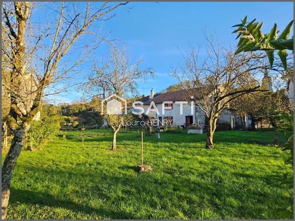 Maison à conforter avec jardin et grange.