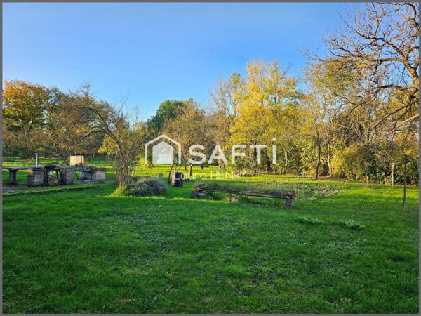 Maison à conforter avec jardin et grange.