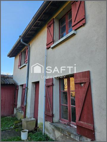 Maison à conforter avec jardin et grange.