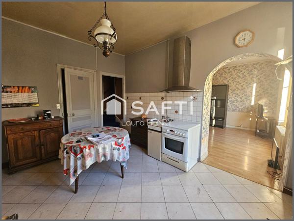 Maison à conforter avec jardin et grange.