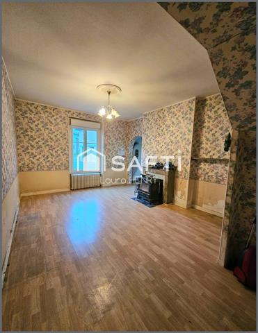 Maison à conforter avec jardin et grange.