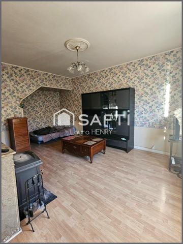 Maison à conforter avec jardin et grange.