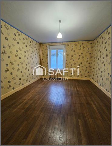 Maison à conforter avec jardin et grange.