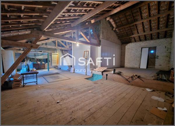 Maison à conforter avec jardin et grange.