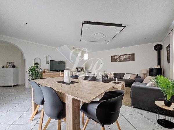 Élégante villa familiale, prestations de qualité dans quartier prisé.