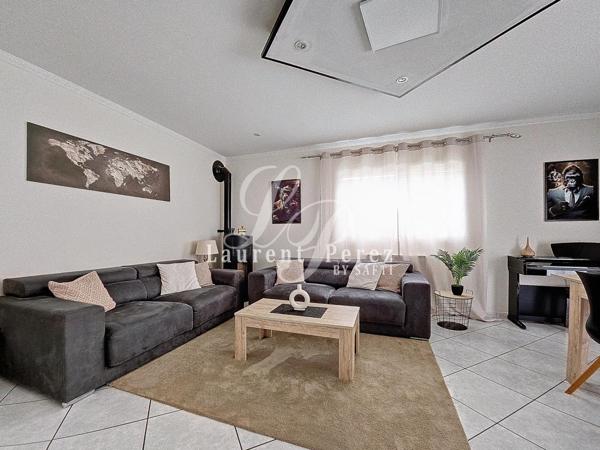 Élégante villa familiale, prestations de qualité dans quartier prisé.