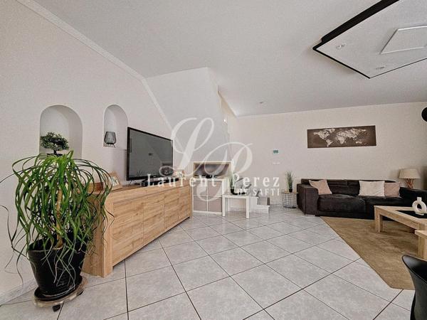 Élégante villa familiale, prestations de qualité dans quartier prisé.