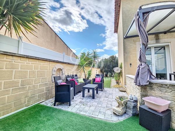 Élégante villa familiale, prestations de qualité dans quartier prisé.