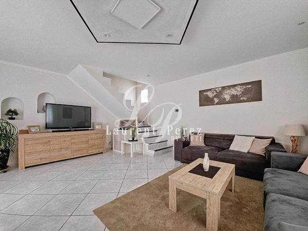 Élégante villa familiale, prestations de qualité dans quartier prisé.