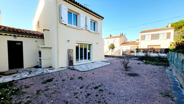 MAISON DE VILLE AVEC 3 CHAMBRES GARAGE ET JARDIN A CARCASSONNE