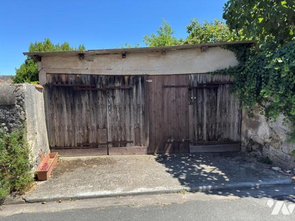 GRANDE MAISON DE VILLAGE  AVEC JARDIN ET GARAGE