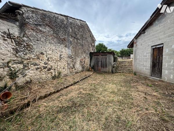 GRANDE MAISON DE VILLAGE  AVEC JARDIN ET GARAGE