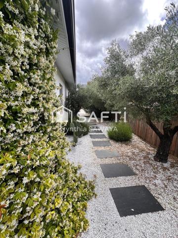 Maison moderne et charmante avec jardin paysager, terrasse et piscine
