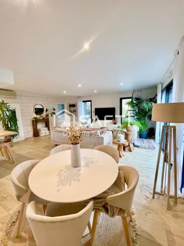 Maison moderne et charmante avec jardin paysager, terrasse et piscine