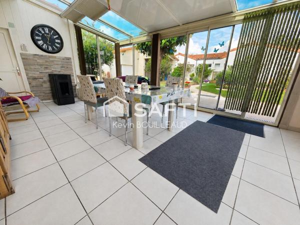 Maison plain-pied 177m², terrain 940m² avec sous-sol aménagé.
