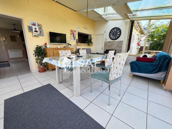 Maison plain-pied 177m², terrain 940m² avec sous-sol aménagé.