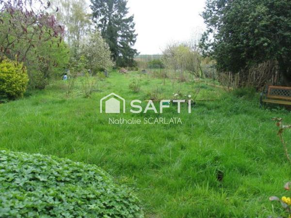 Maison familiale avec 3 chambres et jardin de 700 m²