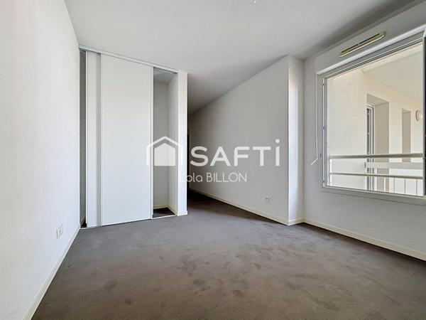 Appartement T3 avec terrasse couverte et place de parking
