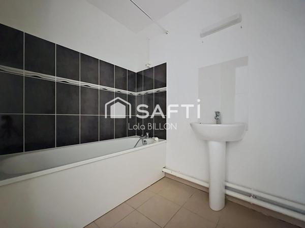 Appartement T3 avec terrasse couverte et place de parking
