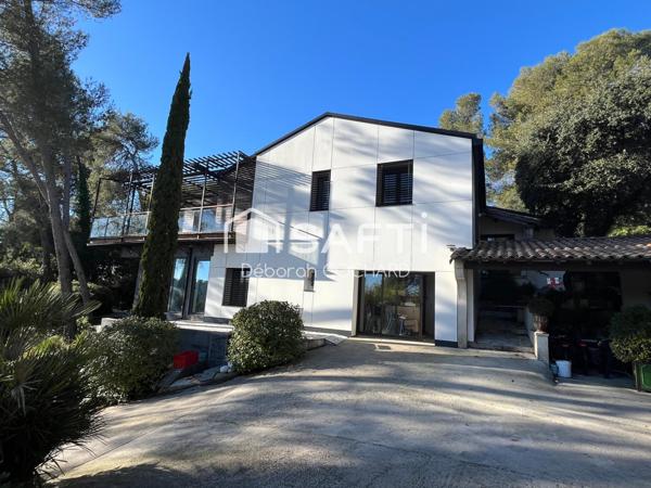 Superbe villa d'architecte de 256m2 hab nichée dans un cadre verdoyant proche commerces