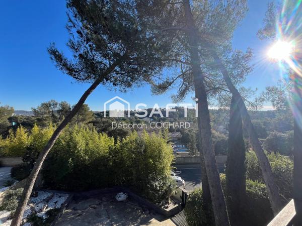 Superbe villa d'architecte de 256m2 hab nichée dans un cadre verdoyant proche commerces