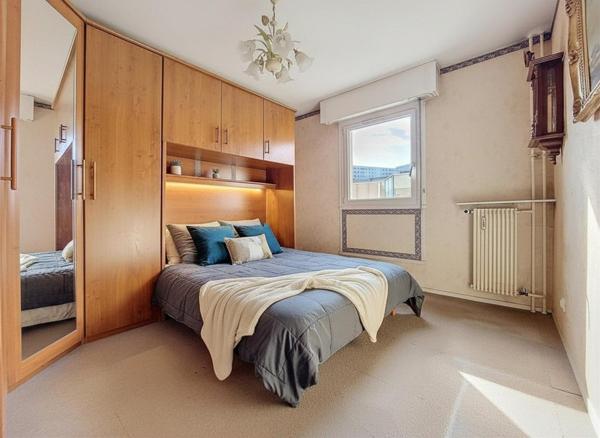 Appartement 85m² lumineux 3 chambres avec balcon, parking et cave