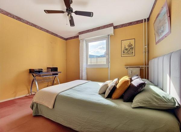 Appartement 85m² lumineux 3 chambres avec balcon, parking et cave