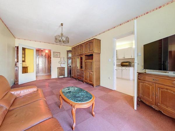 Appartement 85m² lumineux 3 chambres avec balcon, parking et cave