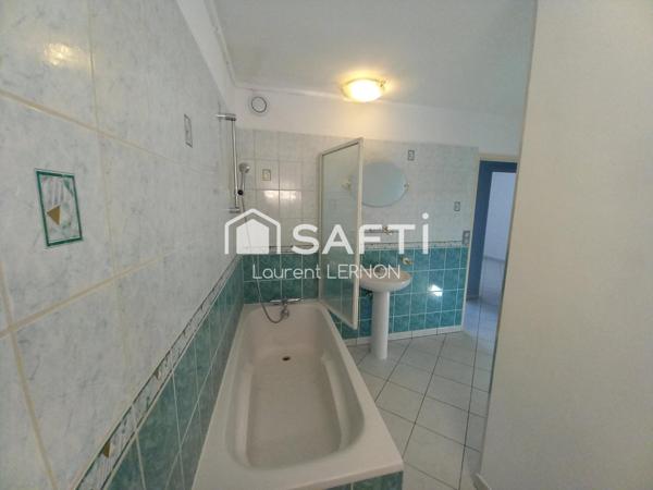 APPARTEMENT DE 91 M² AU 4ème ETAGE. CAVE. PARKING