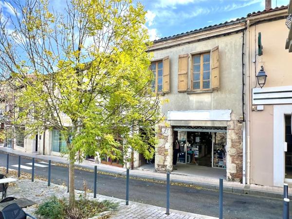 IMMEUBLE AVEC LOCAL COMMERCIAL ET 3 APPARTEMENTS