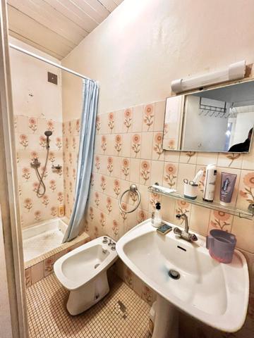 IMMEUBLE AVEC LOCAL COMMERCIAL ET 3 APPARTEMENTS