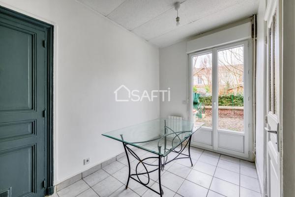 Appartement de 2 pièces en rez-de-jardin
