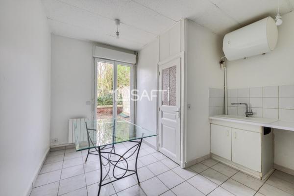 Appartement de 2 pièces en rez-de-jardin