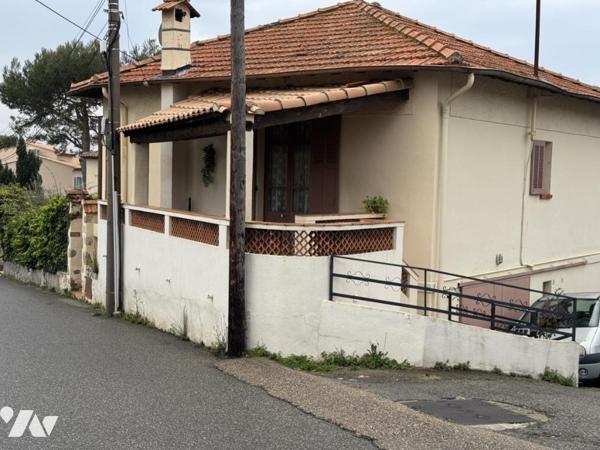 Maison individuelle sur 2  niveaux avec garage 