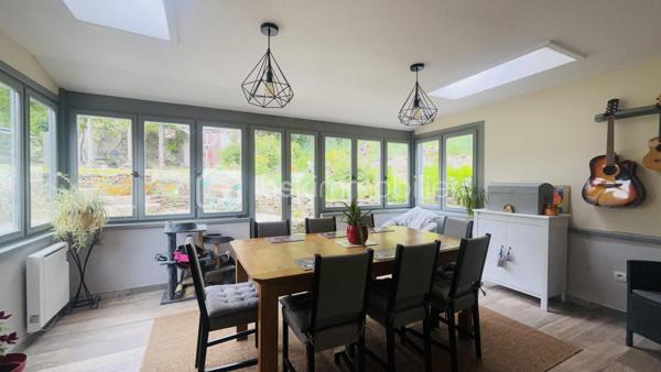 Située dans un environnement calme et rural, découvrez le charme de cette maison construite en 1949 sur un terrain d’environ 1900 m². 

Belle maison, entièrement rénovée en pierre de taille, offre un équilibre entre le charme de l’ancien et le confort moderne dans une tranquillité absolue. Elle permet également de profiter d’un espace  extérieur agréable grâce à son jardin aménagé et d’une piscine hors sol. 
La présence d’un hangar de 90m², d’un abri de jardin en bois et d’une dépendance à rénover de plus de 70m², sont  des plus pour les aventureux.

Ce bien est situé à la campagne de Landeleau, entre la ville de Carhaix et de Châteauneuf-du-Faou. 
Cette charmante maison est composée de : 
Au rez-de-chaussée 
- D’une entrée
- D’un séjour de 21m²
- D’une cuisine équipée de 17m² , 
- D’une véranda isolée et chauffée de 17m². 
A l’étage : 
- Une chambre parentale avec sa salle d’eau privative et son WC de 12m² ; 
- Deux pièces bien aménagées de 6m² et 5m² en loi Carrez 
- Salle de douche ; 
La véranda est ouverte sur sa terrasse et son agréable jardin. 

Il faut parler de l'aspect techniques  :
-	Huisseries en bois double vitrage
-	Chauffage électrique et poêle à bois
-	Volets battants au rez-de-chaussée
-       Isolation murs et toitures
-       Toiture en bon état 
-	VMC dans les toilettes du rez-de-chaussée 
-	Assainissement en fosse septique avec pompe de relevage. 

Le jardin est clos, sans vis-à-vis à l'arrière de la propriété. Terrain arboré et aménagé.   
Elle est à la recherche de nouveaux propriétaires qui pourraient être vous. Pour la visiter, me contacte au 07 64 41 12 36 ou par mail'e.barre@bskimmobilier.com.