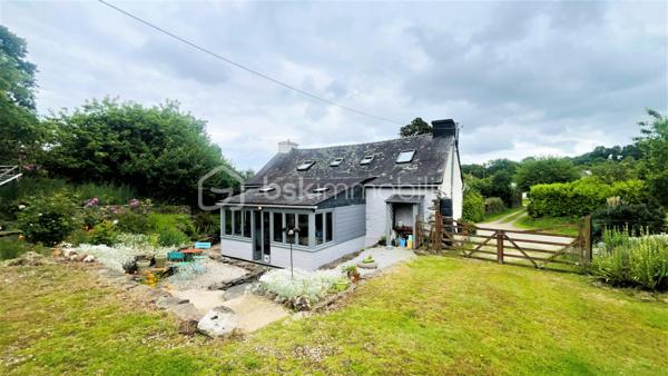 Située dans un environnement calme et rural, découvrez le charme de cette maison construite en 1949 sur un terrain d’environ 1900 m². 

Belle maison, entièrement rénovée en pierre de taille, offre un équilibre entre le charme de l’ancien et le confort moderne dans une tranquillité absolue. Elle permet également de profiter d’un espace  extérieur agréable grâce à son jardin aménagé et d’une piscine hors sol. 
La présence d’un hangar de 90m², d’un abri de jardin en bois et d’une dépendance à rénover de plus de 70m², sont  des plus pour les aventureux.

Ce bien est situé à la campagne de Landeleau, entre la ville de Carhaix et de Châteauneuf-du-Faou. 
Cette charmante maison est composée de : 
Au rez-de-chaussée 
- D’une entrée
- D’un séjour de 21m²
- D’une cuisine équipée de 17m² , 
- D’une véranda isolée et chauffée de 17m². 
A l’étage : 
- Une chambre parentale avec sa salle d’eau privative et son WC de 12m² ; 
- Deux pièces bien aménagées de 6m² et 5m² en loi Carrez 
- Salle de douche ; 
La véranda est ouverte sur sa terrasse et son agréable jardin. 

Il faut parler de l'aspect techniques  :
-	Huisseries en bois double vitrage
-	Chauffage électrique et poêle à bois
-	Volets battants au rez-de-chaussée
-       Isolation murs et toitures
-       Toiture en bon état 
-	VMC dans les toilettes du rez-de-chaussée 
-	Assainissement en fosse septique avec pompe de relevage. 

Le jardin est clos, sans vis-à-vis à l'arrière de la propriété. Terrain arboré et aménagé.   
Elle est à la recherche de nouveaux propriétaires qui pourraient être vous. Pour la visiter, me contacte au 07 64 41 12 36 ou par mail'e.barre@bskimmobilier.com.